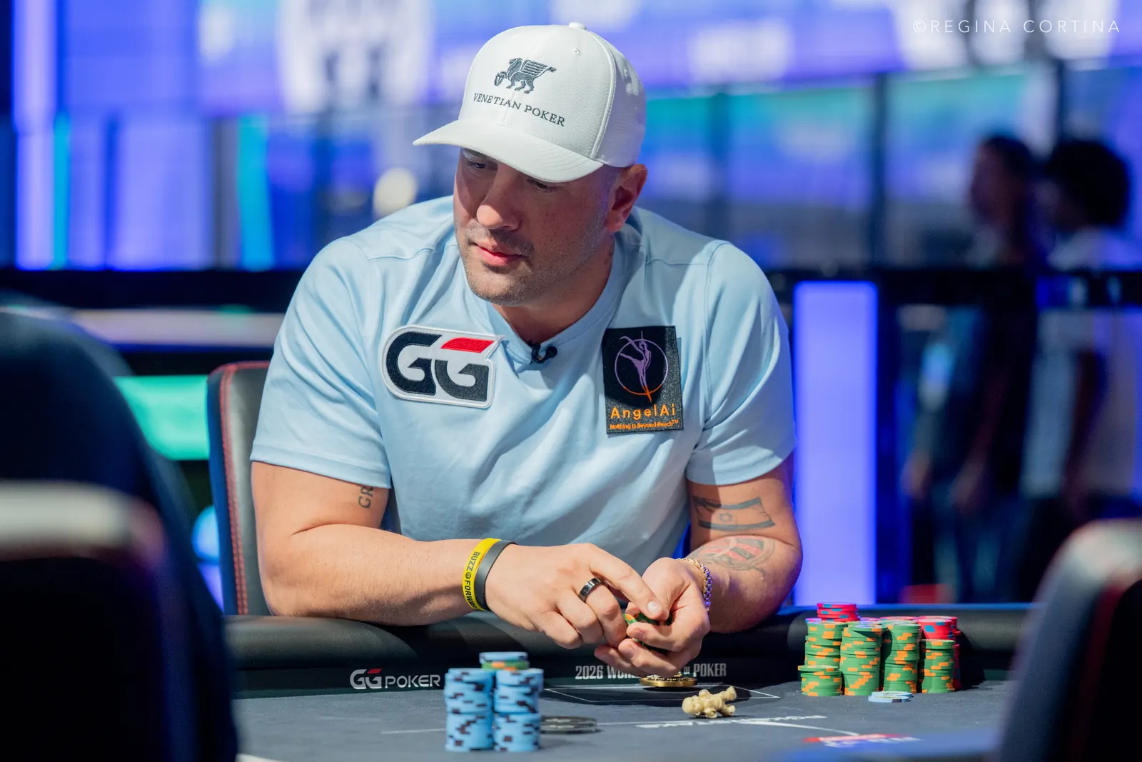 Michael Mizrachi at a poker table, focused on the game during the WSOP $10K Pot-Limit Omaha Championship.