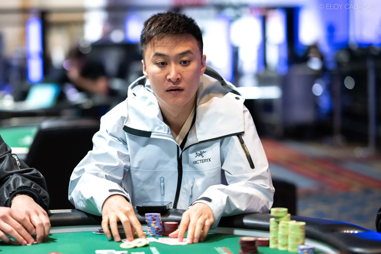 Professional poker player Biao Ding at a poker table during a World Series of Poker tournament.
