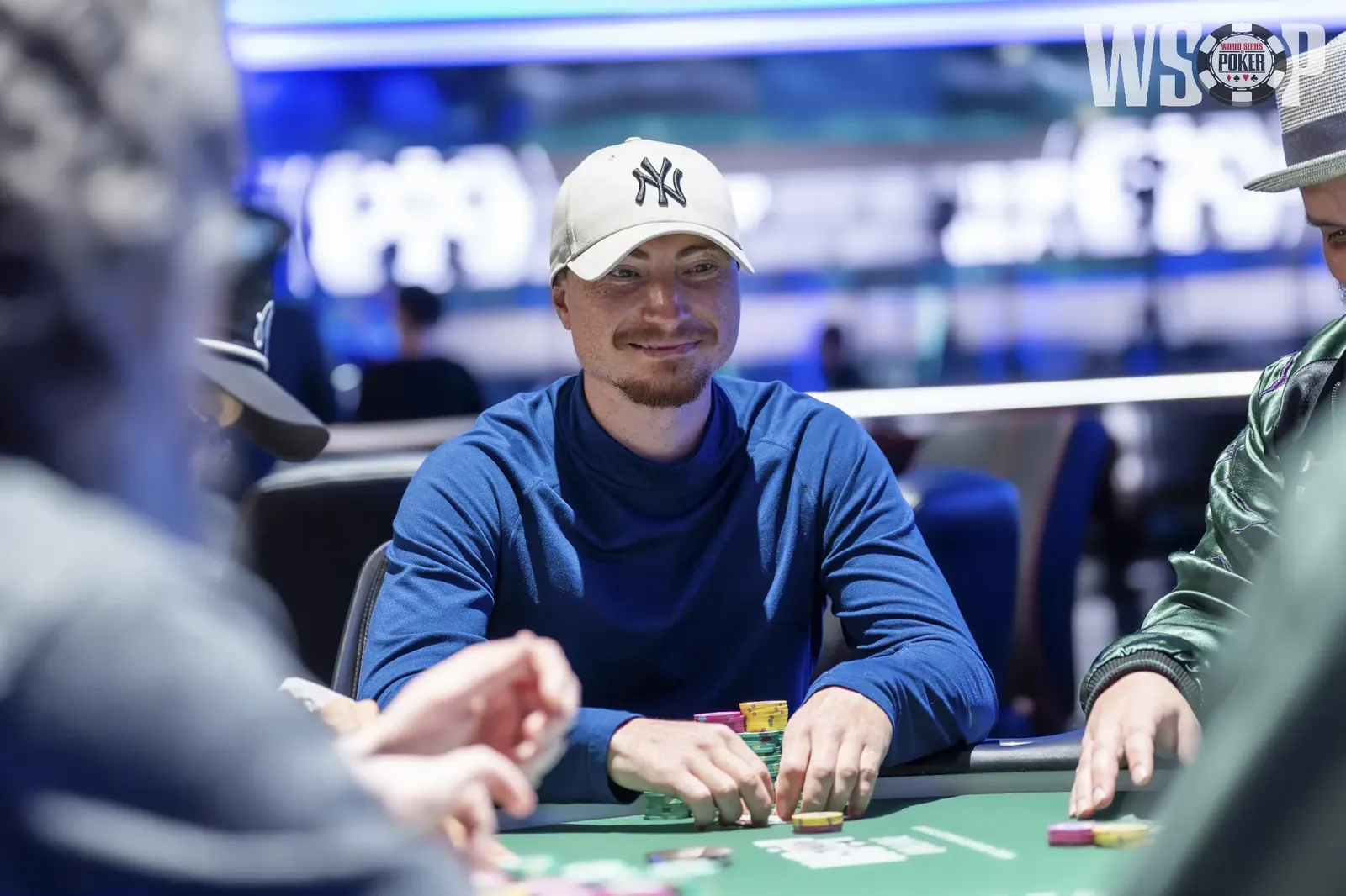 Poker players at a table during a World Series of Poker event.