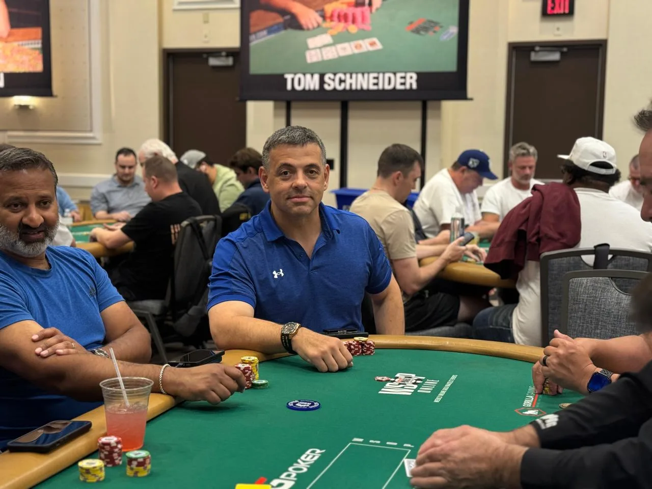 Poker players at tables during the World Series of Poker Seniors Championship.
