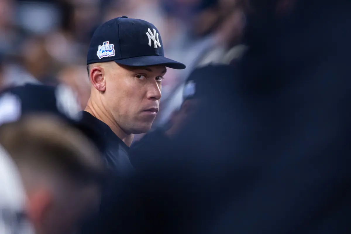 Aaron Judge in a New York Yankees uniform on the field.