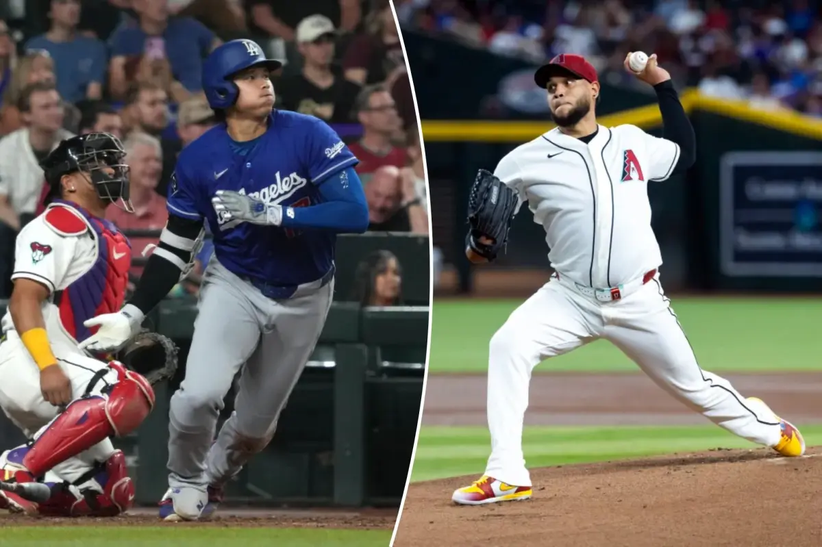Baseball players from the Los Angeles Dodgers and Arizona Diamondbacks on the field during a game.