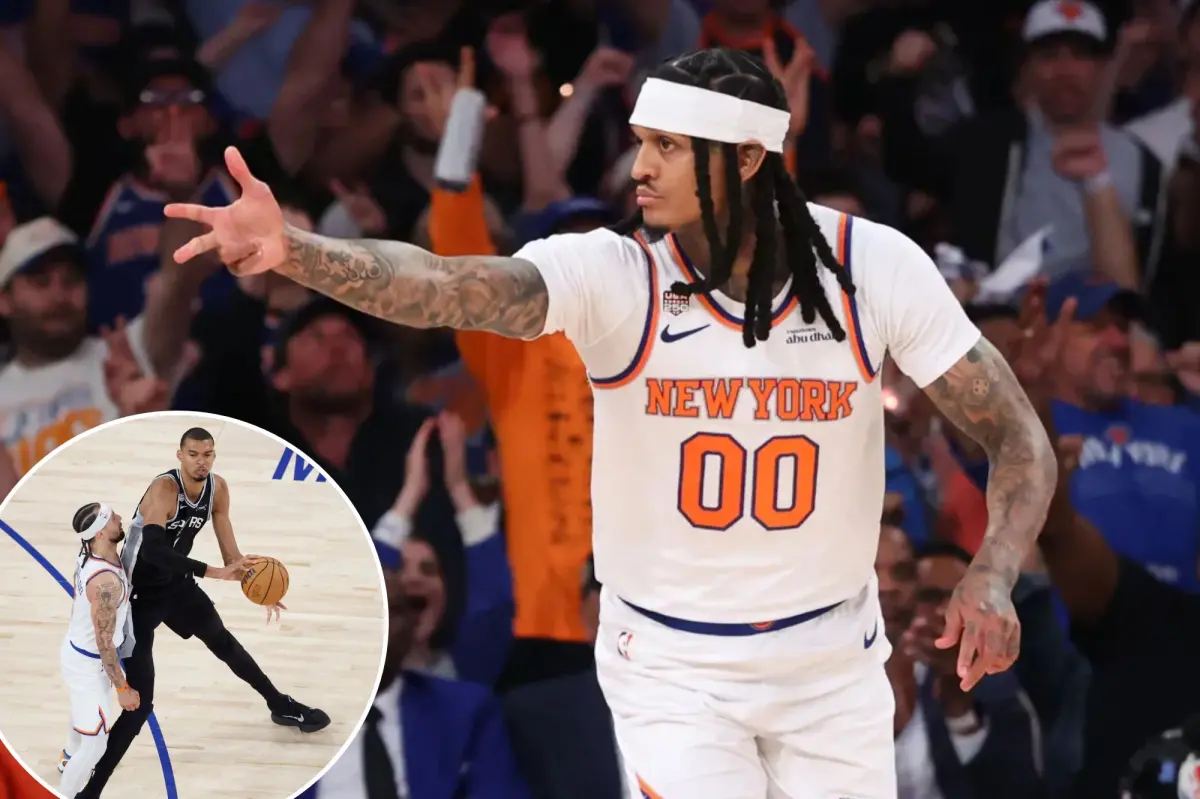 New York Knicks players on the bench during an NBA Finals game.