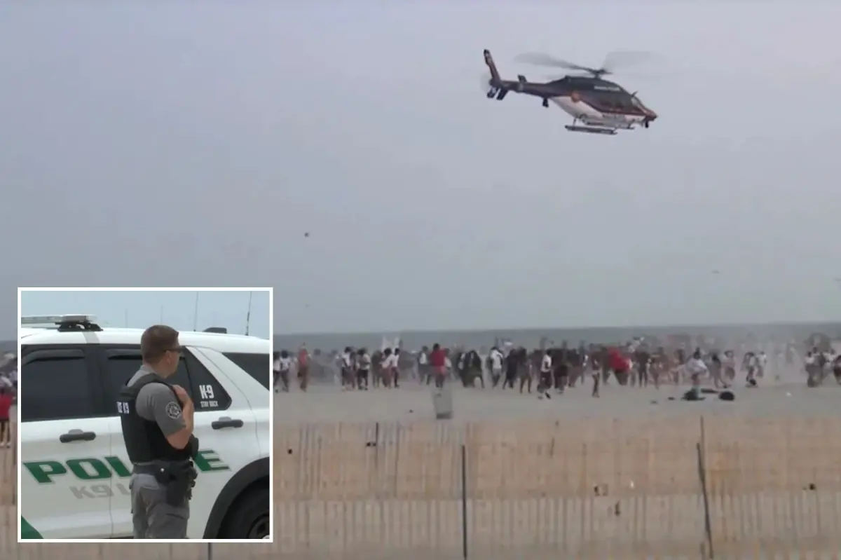 State Park Police officers patrolling on a beach at Robert Moses State Park.