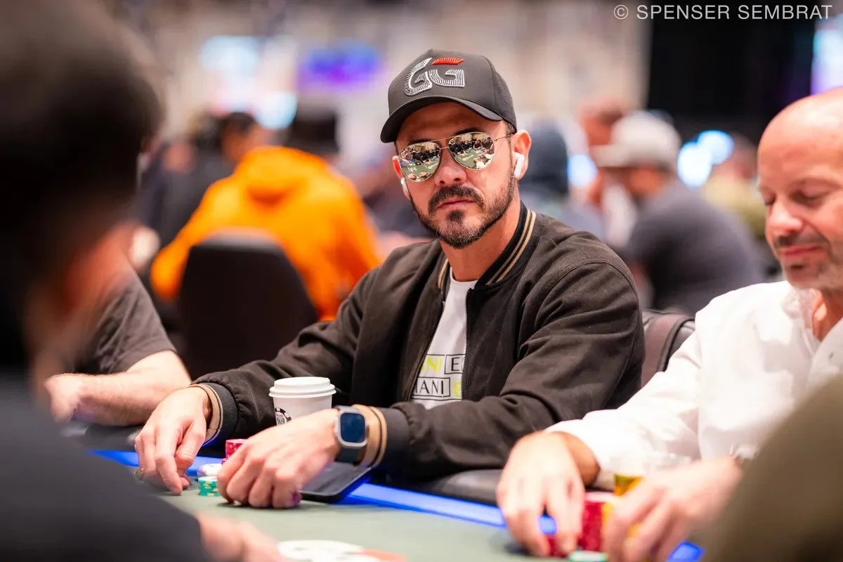 Players seated at poker tables during a World Series of Poker event.