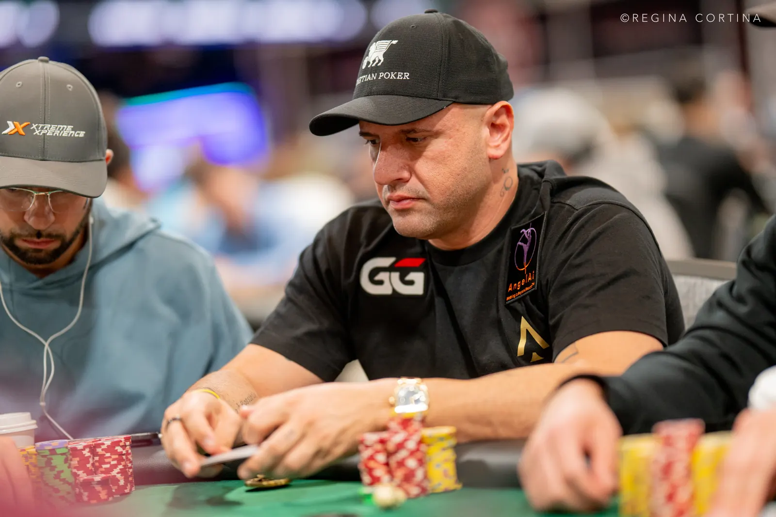 Michael Mizrachi, the defending champion, is seen at a poker table during the World Series of Poker Main Event.