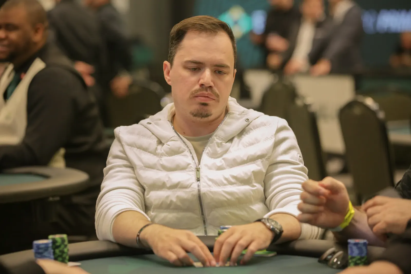 Eduardo Pires and Fábio Sanchez at the BSOP Winter Grand High Roller table after a full house collision on the river