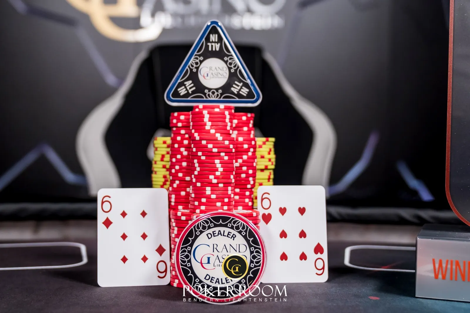 Poker tournament table at Grand Casino Liechtenstein with chips and cards