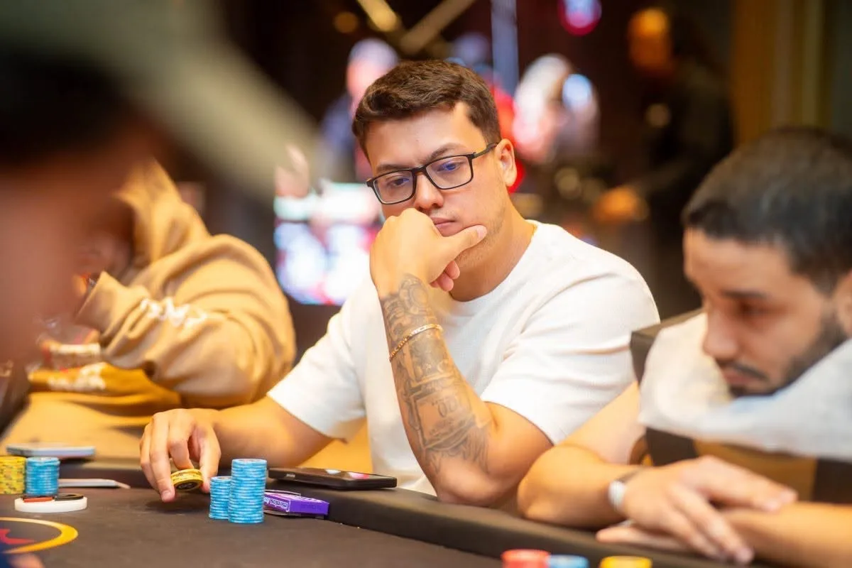 Professional poker player Carlos Fleury in action at a poker tournament