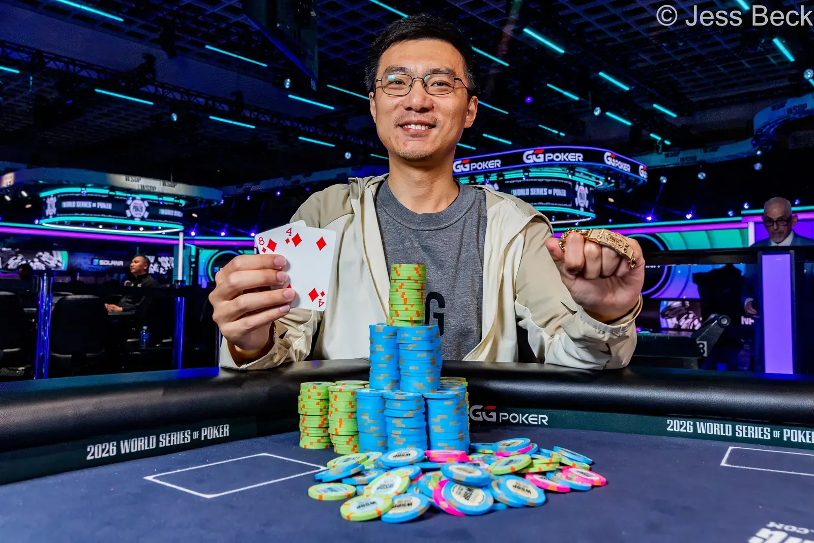 Zixuan Liu, winner of the WSOP $1,000 No-Limit Hold'em event, poses with his gold bracelet.