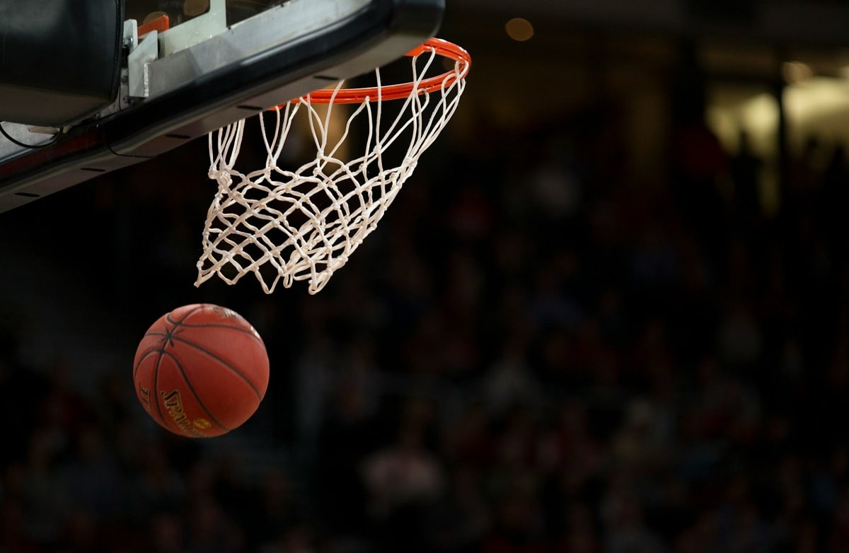 WNBA players Angel Reese and Paige Bueckers during All-Star Weekend, the context of a $400 friendly wager that sparked a betting policy debate
