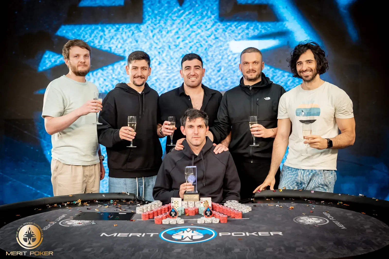 Poker chips and cards at the Merit Poker Cup final table