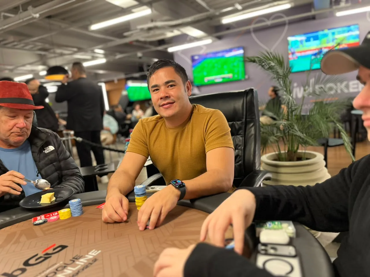 Brazilian poker players Paulino Uemura and Victor Pertile at the start of The Gladiator Super High Roller tournament at Arena Live Poker in Curitiba
